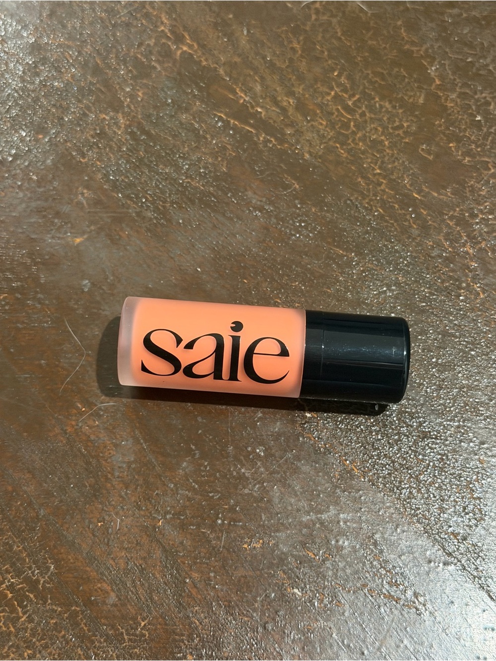 Saie Dew Blush Stick in Coral Peach shade hottie